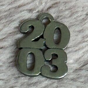 Retired James Avery Sterling Silver “2003” Charm
